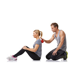 Image showing Massage ball, physiotherapist and studio with a woman with sport, fitness and workout back injury. Physical therapy, man and wellness with physio health and helping with white background and support