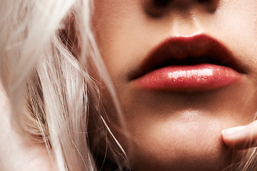 Image showing Woman, closeup zoom and lips with makeup, beauty and wellness with color shine, cosmetics and transformation. Girl, model and mouth with lipstick, change and results for aesthetics with glow on skin