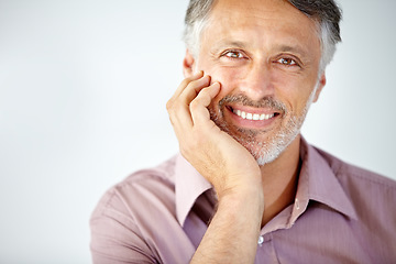 Image showing Smile, portrait and mature businessman in a studio with positive, good and confident attitude. Happy, career and face of professional male lawyer with legal career isolated by gray background.