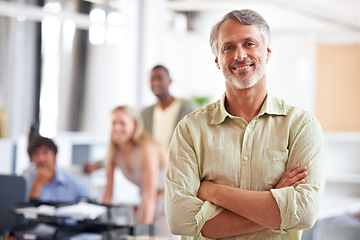 Image showing Director, portrait of businessman with arms crossed for startup agency in creative company or workplace. Blurred background, mature ceo and face or happy with confidence, pride for leadership in job