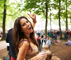 Image showing Happy woman, portrait and peace sign at outdoor music festival or crowd for party, event or DJ in nature. Excited female person smile enjoying audio sound at carnival, concert or performance outside