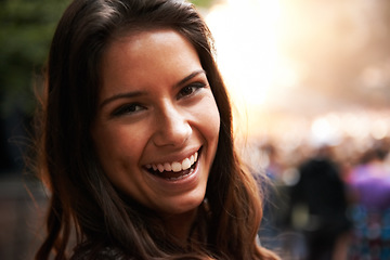 Image showing Portrait, smile and a young woman at a music festival for energy, freedom or celebration outdoor. Face, party and excitement with a happy person in the crowd or audience of a concert performance