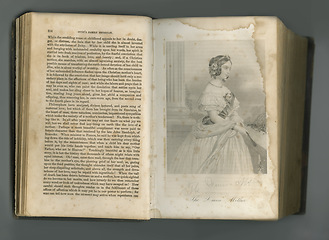 Image showing Old book, vintage and page of the queen mother in literature, text or ancient scripture against studio background. Closeup of historical novel, journal or antique history study of iconic female idle