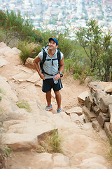 Image showing Outdoor, hiking and man with nature, fitness and exercise with wellness, fresh air or journey with adventure. Person, hiker and guy with backpack, hobby and activity with workout, training and travel