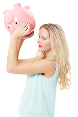 Image showing Woman, piggy bank and finance or savings in studio with cash investment, financial growth or wealth. Person, money box and budget or banking for increase or income on white background with smile