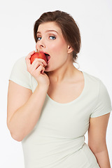 Image showing Health, apple and food with portrait of woman in studio for nutrition, wellness or organic. Happy, sustainable and diet with face of female person and fruit on white background for fiber and vitamins