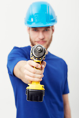 Image showing Construction worker man, drill and studio portrait with hand for maintenance by white background. Person, employee or small business owner with power tools, helmet and job at repair services company