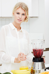 Image showing Woman, portrait and fruit for smoothie in kitchen, health nutrition and vegan diet for food in apartment. Person, face or blender in berries for juice, vitamins or detox wellness for energy in home