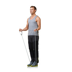 Image showing Exercise, man and resistance band to workout in studio, gym and weight training for strong muscles. Sports person, fitness and commitment with equipment in mockup and cardio on white background