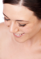 Image showing Beauty, eyelash and woman in studio for makeup, cosmetics or wellness closeup. Mascara, face and happy lady model with lash, filler or extensions, volume or pamper with soft glam result satisfaction