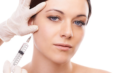 Image showing Woman, portrait and needle for plastic surgery in studio for injection, chemical and product by white background. Girl patient, surgeon and syringe for change, transformation and results with beauty