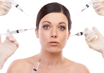 Image showing Woman, portrait and syringe for plastic surgery in shock in studio, injection and chemical by white background. Girl patient, surgeon and wow for needle with change, transformation or beauty results