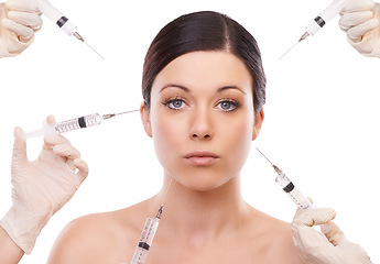 Image showing Woman, portrait and injection for plastic surgery in studio with hands, chemical and product by white background. Girl patient, surgeon and syringe for change, transformation and results with beauty