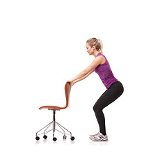 Image showing Office, chair and woman in squat, exercise or crouch in white background or studio. Person, stretching and workout with a seat for fitness, health and wellness or pilates practice for posture
