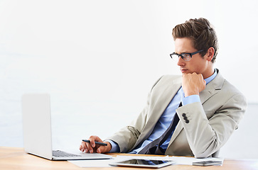 Image showing Business man, computer and thinking of stock market research, trading solution and choice or decision. Professional person or trader reading in glasses and vision for financial planning on his laptop