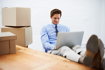 Image showing Businessman, shipping and smiling on laptop, entrepreneur and online logistics for courier. Happy male person, professional and delivery for company distribution, relax and package or internet