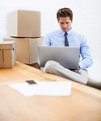 Image showing Business man, shipping boxes and typing on laptop, entrepreneur and online logistics for courier. Male person, professional and delivery for company distribution, package and technology or internet