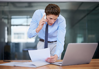 Image showing Business man, phone call and reading computer, documents and paperwork for planning, accounting and financial advice. Professional worker talking on mobile and laptop information or taxes management