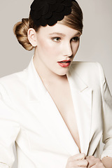 Image showing Woman, face and thinking with fashion in studio with confidence, pride and elegant style or hairband. Person, idea and designer outfit with hair accessory or classic for aesthetic on white background