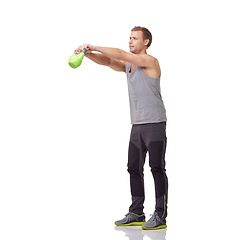 Image showing Training, strong and studio man with kettlebell for arm muscle growth, strength power development or weightlifting routine. Gym equipment, active workout and male bodybuilder on white background