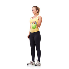 Image showing Training, weightlifting and studio woman with kettlebell curl for muscle growth, arm strength development or bicep workout. Gym weights, active bodybuilding and female athlete on white background