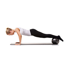 Image showing Fitness, workout and woman on floor with ball for pilates, wellness care and health in studio. Gym, training and girl on mat with cardio, energy and muscle exercise isolated on white background.