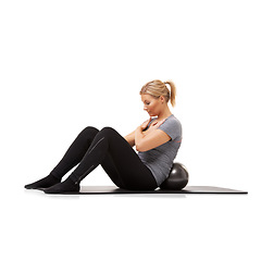 Image showing Fitness, sit up and woman on floor with ball for pilates, body care and health in studio. Gym, training and girl on mat with cardio, energy and muscle workout on ground isolated on white background.