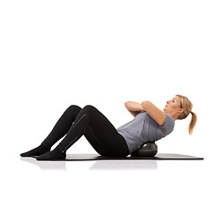 Image showing Sit up, exercise and woman on floor with ball for pilates, body building care and health in studio. Gym, training and girl on mat with cardio, energy and muscle workout isolated on white background.