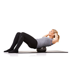 Image showing Exercise ball, fitness and woman with workout, energy and wellness isolated on a white studio background. Person, mockup space and girl with training, healthy and breathing with balance or stretching