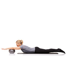 Image showing Stretching arms, pilates and woman on ball in workout, training and healthy body isolated on a white studio background mockup space. Flexible, mat or person on equipment for balance, sport or fitness