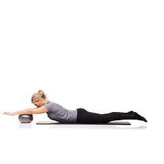 Image showing Stretching, yoga exercise or woman on ball in workout, training or body health isolated on a white studio background mockup space. Flexible, mat or person on equipment for balance, pilates or fitness