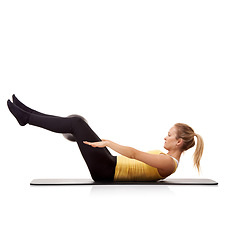Image showing Woman training on medicine ball, crunches and workout body health isolated on a white studio background mockup space. Equipment, core abdomen muscle and person in fitness, pilates and sit up exercise