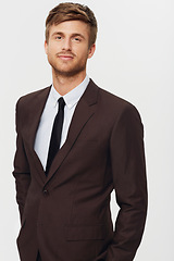 Image showing Portrait, business and a confident young man in studio on a white background for a corporate career or job opportunity. Company, work and a professional person in a suit as an employee or salesman