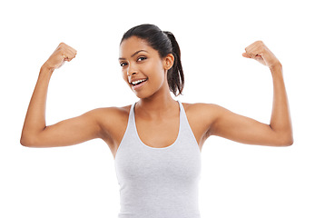 Image showing Flexing arms, portrait and woman with fitness, strong muscle and wellness isolated on a white studio background. Face, person and model with progress, endurance and healthy with confidence and smile