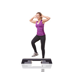 Image showing Aerobics, fitness and woman with exercise, training and wellness isolated on a white studio background. Person, model and girl with workout, healthy and balance with routine, weight loss and smile