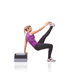 Image showing Woman, aerobics step and training in studio profile with smile, exercise or health by white background. Girl, person and mockup space for workout, fitness or wellness on floor with balance for muscle