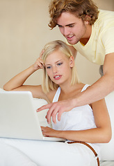 Image showing Laptop, choice and couple on sofa with social media search, movies or streaming at home together. Online shopping, relax and people in living room checking ecommerce, website or deal, sale or survey