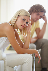 Image showing Divorce, fight and couple on sofa with stress, anxiety or cheating depression in their home. Marriage, crisis and frustrated woman overthinking in living room with commitment, doubt or liar conflict