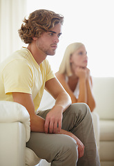 Image showing Couple fight, angry and divorce stress on a sofa with argument, anxiety or cheating depression in their home. Marriage crisis, dispute and overthinking man ignore frustrated woman in a living room