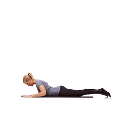 Image showing Woman, exercise and mat in studio for cobra, pilates or workout for healthy body, wellness and core muscle. Person, fitness and yoga on floor for abdomen health on mockup space and white background