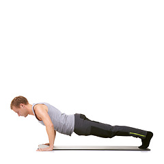 Image showing Man, exercise and mat in studio for push ups, fitness or workout for healthy body, wellness or core muscle. Person, balance and training on floor or abdomen health on mockup space or white background