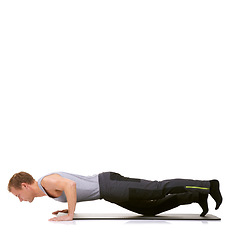 Image showing Man, workout or mat in studio for stretching, fitness or exercise for healthy body, wellness or core muscle. Person, balance or training on floor or abdomen health on mockup space or white background