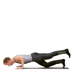 Image showing Man, pilates and mat in studio for push ups, fitness or workout for healthy body, wellness or core muscle. Person, exercise or yoga on floor for abdomen health on mockup space or white background