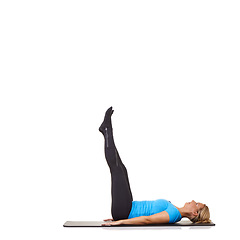Image showing Woman, pilates and mat in studio for stretching leg, fitness or workout for healthy body, wellness and core muscle. Person, exercise and yoga on floor for kegel health on mock up or white background