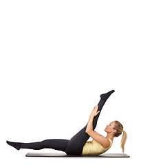 Image showing Woman, legs and stretching on yoga mat for gym flexibility, mockup space or white background. Female person, challenge and healthy wellness in studio for progress, splits practice or pilates training