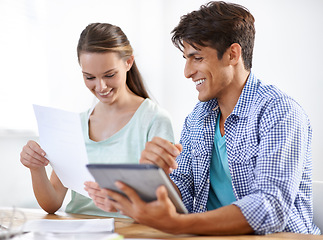 Image showing Office, happy woman and man with tablet, documents and proposal for online research. Startup, partnership and business people at desk at digital design with collaboration, coworking and paperwork.