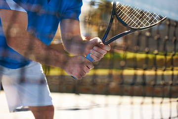 Image showing Tennis match, fitness and hands in outdoors, competition and man playing on court at country club. Athlete, training and exercise or racket for game, performance and practice or workout at stadium