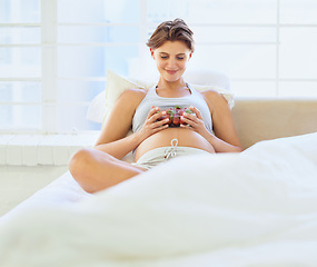 Image showing Pregnant woman, strawberry and fruit in bedroom with relax wellness for vegan nutrition in house. Young person, happy and prenatal health diet with hungry for food and vitamins for breakfast in home