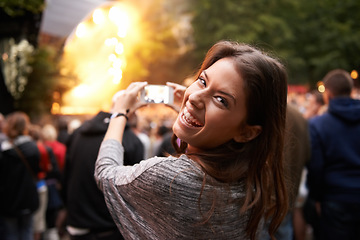 Image showing Woman, music festival and cellphone picture of stage entertainment, party concert or crowd audience. Female person, mobile device and performance rock event or rave, photography or dj celebration