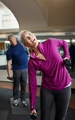 Image showing Senior fitness, dumbbells and people stretching at gym for training, wellness and cardio exercise. Class, workout and elderly men with old personal trainer for weightlifting, support or bodybuilding